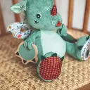 83299-Peluche-Joe-Dragón-Multisensorial-Lilliputiens-Jugueteria-Mukkies-c.webp