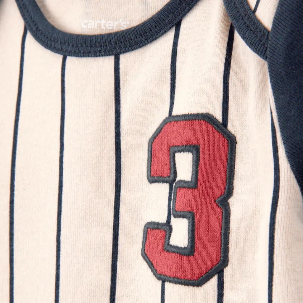 Detalle-1-Pack-cinco-bodis-de-algodón-de-manga-corta-con-diseño-béisbol-Mookie-Lanzarote.webp
