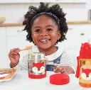 Niña con Termo para comida fria_caliente Zorro-Skip Hop-ideal para colegio.webp